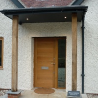 Handmade oak timber front door and gate 1
